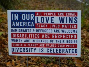 https://commons.wikimedia.org/wiki/File:In_Our_America_Sign_(31167857504).jpg
