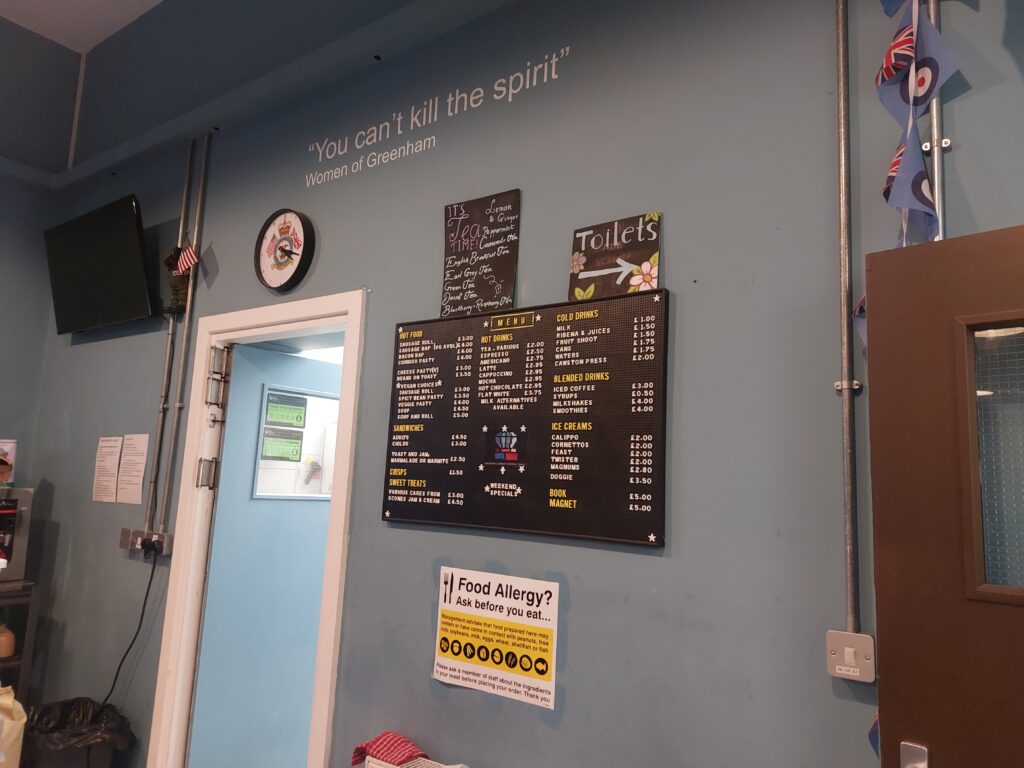 cafe sign you can't kill the spirit women of greenham
