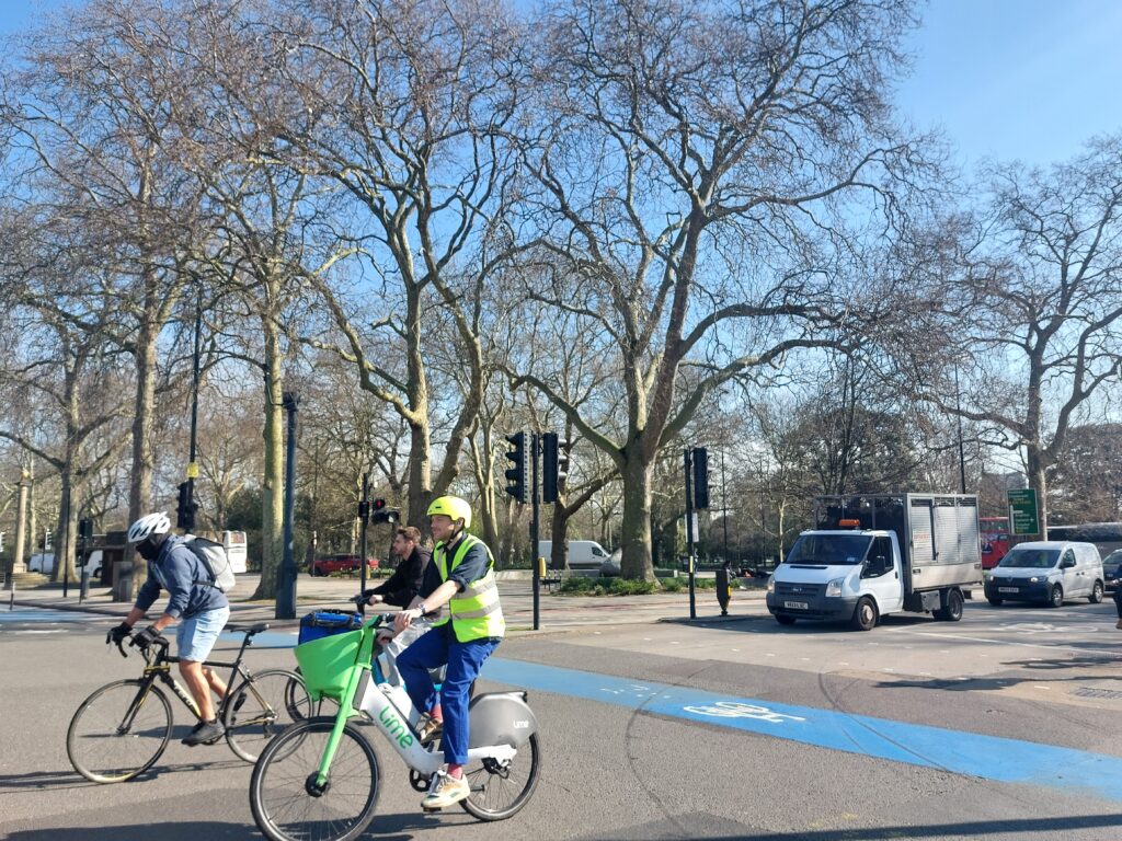 kennington triangle people on bikes crossing the triangle road